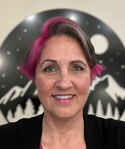 A photograph of Melanie Schlotterbeck.